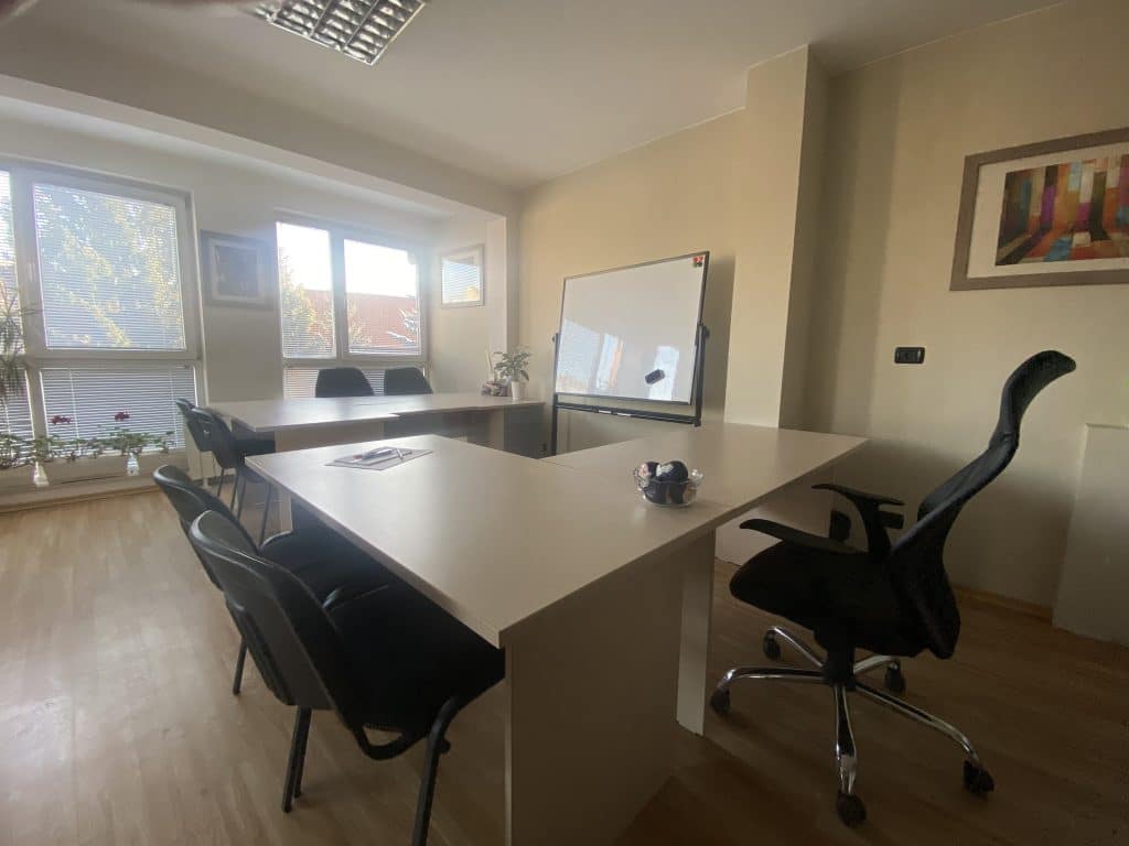 class room with a table and chairs